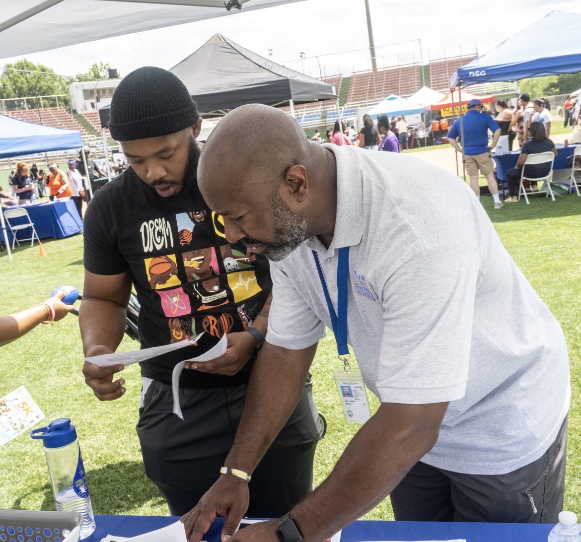 County employee reviewing resources with a resident